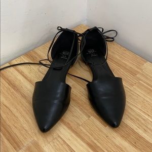 Ballet flats with ties around the ankle